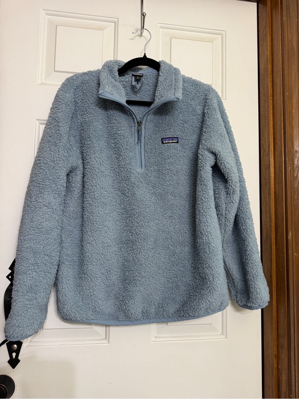 Patagonia Women’s Medium Fuzzy 1/4 zip pullover
Blue/grey soft and warm.
